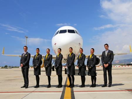 Vueling staff in front of the plane