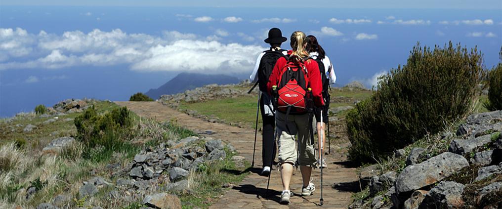 People hiking together in the mountains.